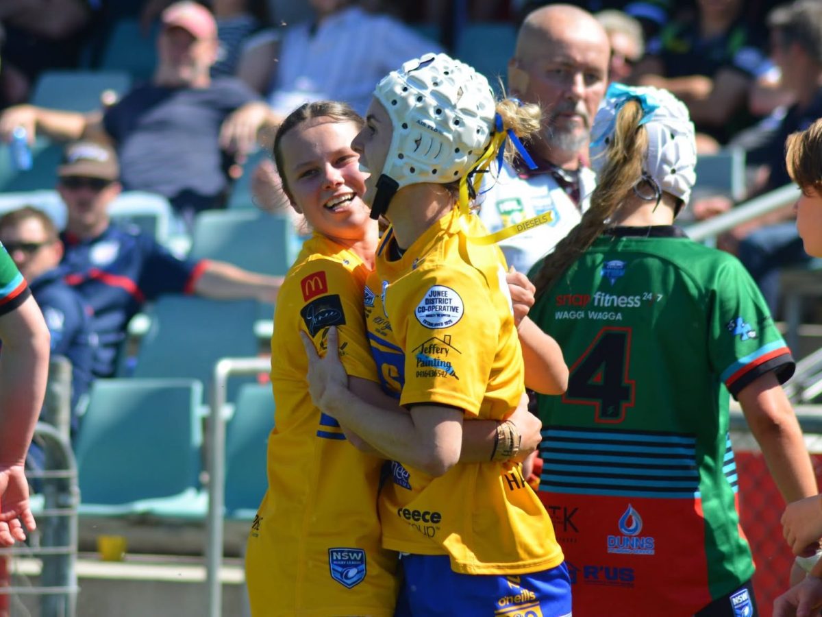 Field stars as Junee downs Wagga Brothers to claim women’s tackle premiership in centenary year